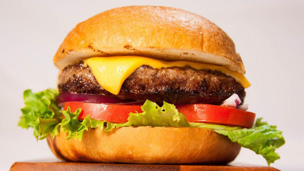 Cheeseburger · Delicious juicy beef patty with cheese and house toppings on a buttery bun.