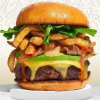 Bad Boy Burger · Plant-based impossible patty grilled and topped with fries, avocado, caramelized onions, ket...