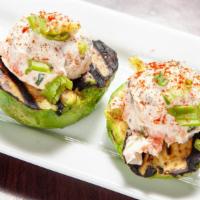 Grilled Avocado · Two grilled avocado halves stuffed with cream cheese, pico de gallo, and Norwegian smoked tr...