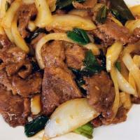 Mongolian Beef · Spicy. Spicy beef mixed with onions and green onions. Served with white rice.