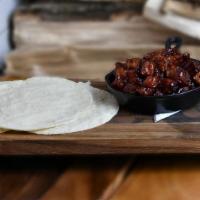 Pork Belly Burnt Ends · Smoked, tender pork belly tossed in our signature 3.2.1 sauce. Served with warm corn tortill...