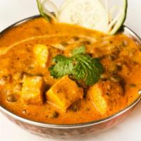 Mutter Paneer · Gluten-free. Fresh homemade paneer cheese cooked with olive oil, green peas, tomato sauce, g...