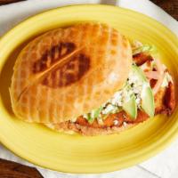 Torta Ala · A torta sandwich with your choice of meat garnished with beans, lettuce, tomato, cheese, sou...