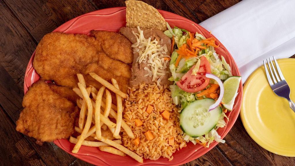 Milanesa De Pollo · Breaded chicken breast, pan fried and topped with French fries. Served with Spanish rice, refried beans, and salad.