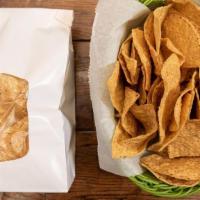 Bag Of Chips · Our thick cut, corn tortilla chips.  Perfect for dipping.  Unsalted.