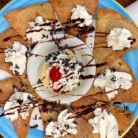 Sopapillas · Flour fritters cut finger size, tossed in cinnamon, sugar, and drizzled with condensed sweet...