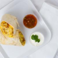 Breakfast Burrito · Scrambled eggs, hash browns, bacon, American and pepper Jack cheese served with salsa and so...