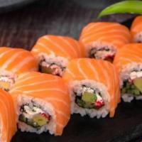 Rainbow Roll (8 Pcs) · Raw fish. (Crab, avocado, cucumber, topped with tuna, yellowtail, salmon and white fish).