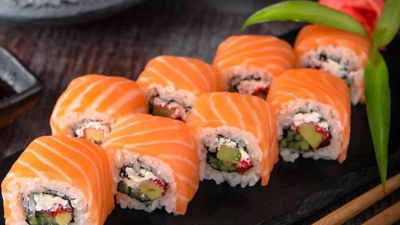 Rainbow Roll (8 Pcs) · Raw fish. (Crab, avocado, cucumber, topped with tuna, yellowtail, salmon and white fish).