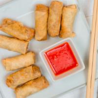 Mini Egg Rolls (8Pc) · Crispy roll filled with chicken and clear noodles.