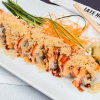 Samurai Maki · Tempura shrimp and cream cheese topped with crab stick, tempura crumbs, unagi sauce, and swe...