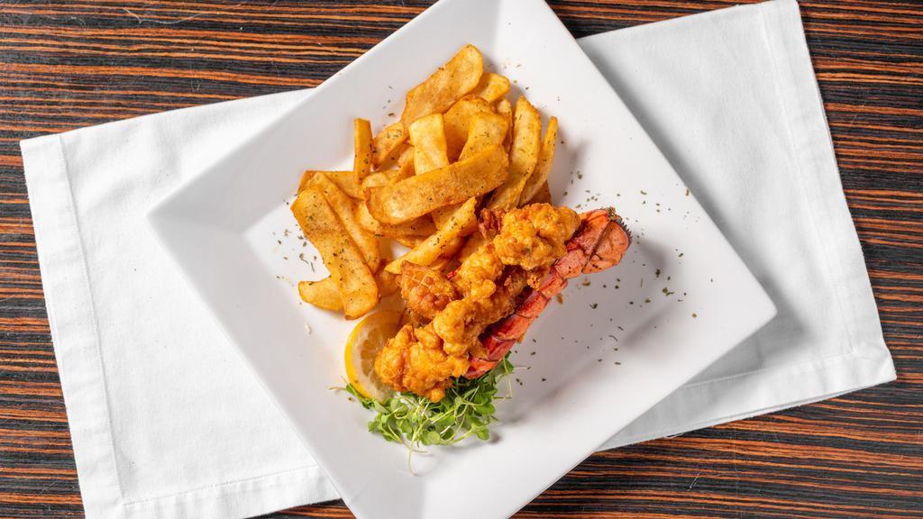 Lobster Bites · Deep fried wild caught lobster, Cajun fries.