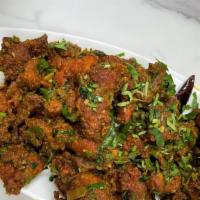 Chicken Manchurian · Well marinated Boneless chicken with Indian spices and sautéed with chef made Manchurian sau...