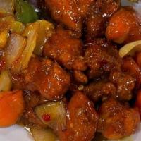 Dragon Chicken · Indo-Chinese Fusion. Thin long strips of chicken breast are marinated and deep fried, tossed...