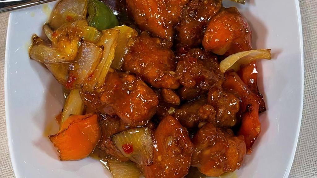Dragon Chicken · Indo-Chinese Fusion. Thin long strips of chicken breast are marinated and deep fried, tossed with cashews, veggies, and yummy sauces.