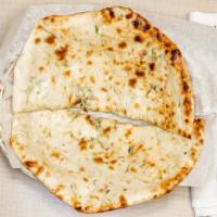 Chilli Cheese Naan · Bread baked in Tandoor grill stuffed with cheese and chillies and made to perfection.