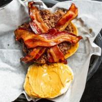 Peanut Butter Bacon Burger · Third pound patty topped with peanut butter and thick cut bacon served on a bun.