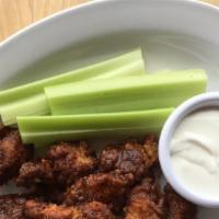Boneless Wings · Choice of red chili, BBQ or buffalo sauce. Served with ranch & celery.