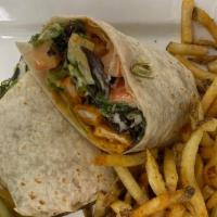 Buffalo Chicken Wrap · Grilled or crispy buffalo chicken with lettuce, tomato, onion & ranch dressing in a flour to...
