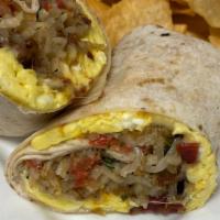 Breakfast Burrito · Flour tortilla stuffed with eggs, bacon, potatoes, pico de gallo, sour cream & cheese. Serve...