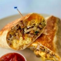 Cowboy Breakfast Burrito · Two scrambled eggs, hashbrown, crispy bacon, BBQ sauce, grilled onions, and melted cheese wr...