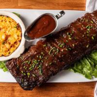 Smoked Pork Bbq Ribs · Smoked ribs seasoned and cooked to perfection. Smothered in our homemade bbq sauce.