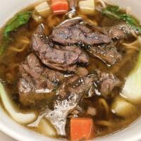 Beef Noodles · Noodles with sliced stewed beef, small bok choy, potatoes, and special spices cooked in curr...