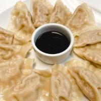 Boiled Pork Dumplings (12 Pieces) · Boiled dumplings with ground pork, napa cabbage, and special seasonings filling.