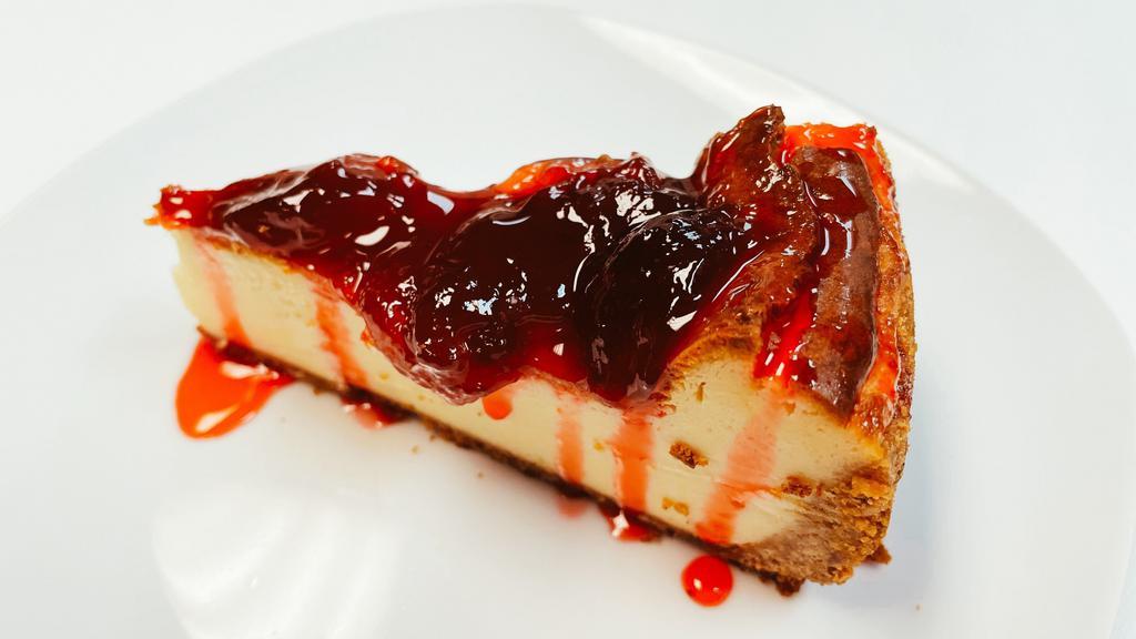 Strawberry Cheesecake · Homemade cheesecake topped with strawberry jam and syrup. Creamy and yummy!