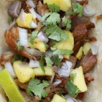Taco Carnitas · Corn tortilla, carnitas, diced red onion, chopped pineapple, cilantro