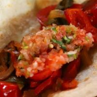 Taco Veggie · Flour tortilla, grilled onions, bell peppers, roasted poblano, salsa. Sub corn tortilla