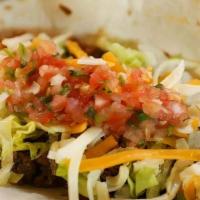 Taco Tex-Mex · Flour tortilla, ground beef, cheese, lettuce, salsa. Sub corn tortilla