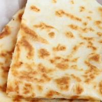 Quesadilla · large flour tortilla & cheese