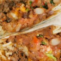 Burrito · Flour tortilla with rice, beans, cheese, & salsa inside