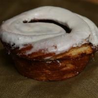 Cinnamon Roll With Icing · A warm cinnamon roll frosted with cream cheese icing.