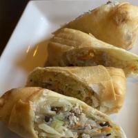 Egg Rolls · Golden fried roll stuffed with cabbage, carrot, onion, glass noodles, black mushroom, and gr...