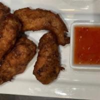 Chicken Wings · Fried wings with a sweet chili dip.