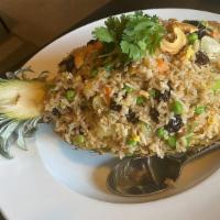 Pineapple Fried Rice · Gluten-free. Flavorful fried rice with sweet juicy pineapple, egg, cashews, raisins, carrot,...
