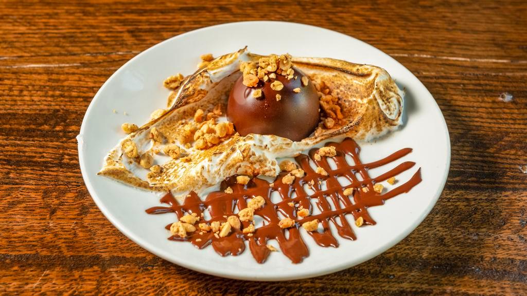 Peanut Butter Bomb · Chocolate dome, peanut butter mousse, peanuts and roasted marshmallow.