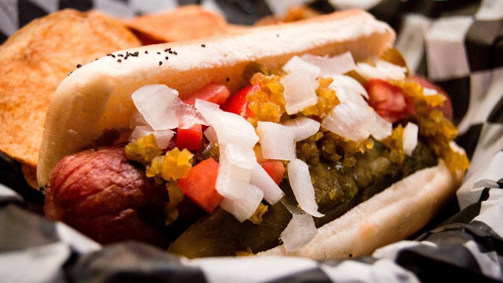 Sully'S Dog · 100% all-beef dog on a poppy seed bun topped with pickles, tomatoes, onion and jalapeño.