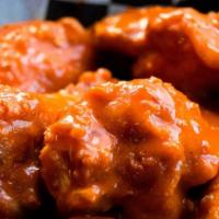Chicken Wings · 10 fresh bone-in chicken wings tossed in your favorite sauce.  Choice of Mild, Hot, Irish Ho...