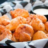 Cheese Curds · Hand-battered local picket fence cheese curds. Ranch dressing and sully's secret sauce for d...