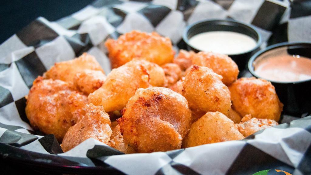 Cheese Curds · Hand-battered local picket fence cheese curds. Ranch dressing and sully's secret sauce for dipping.