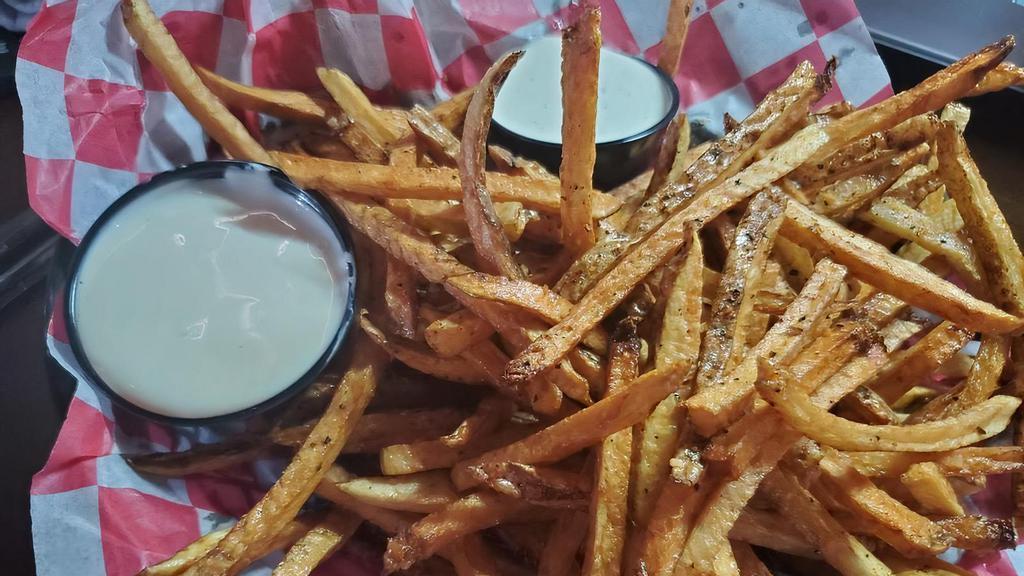 Chips Or Fries Basket · Choice of homemade hand-sliced chips or fresh-cut fries, with side of ranch dressing and alfredo cheese sauce.