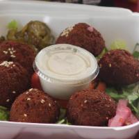 Falafel Plate			
 · Fava beans and chickpeas with seasoning & cooked in vegetable oil. (6 pcs)