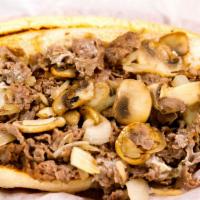 Big Shroom Philly Cheese Steak · Steak or chicken, onions, mushrooms, and white American cheese on an amoroso hoagie.
