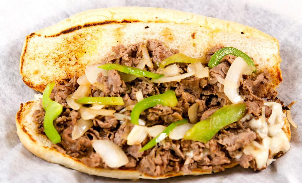 Deluxe Philly Cheese Steak · Steak or chicken, onions, green peppers, mushrooms, and white American cheese on an amoroso hoagie.