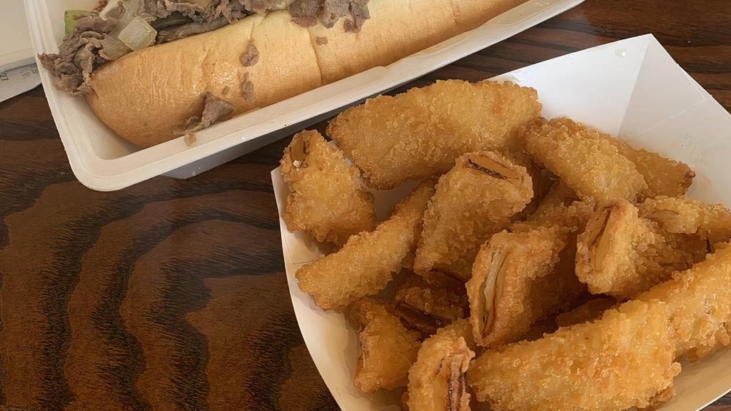 Bayou Philly Cheese Steak · Spicy. Steak or chicken, onions, green peppers, bayou sauce, and white American cheese on an amoroso hoagie.