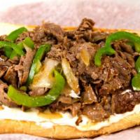 Creamy Philly Cheese Steak · Steak or chicken, onions, green peppers, and cream cheese on an amoroso hoagie.