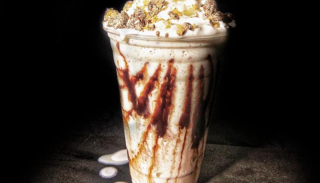 Reese'S Peanut Butter Cup Shake · Reese's Peanut Butter Cups mixed in a Homemade Soft-Serve Vanilla Milkshake!